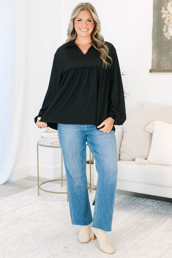 Plus size black Enchanting Days Top with a flowy fit, ribbed texture, and long balloon sleeves.