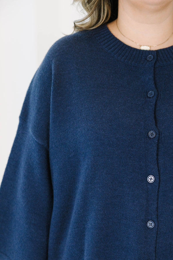 Plus Size navy blue button-down cardigan with a round neckline and wide, three-quarter sleeves.