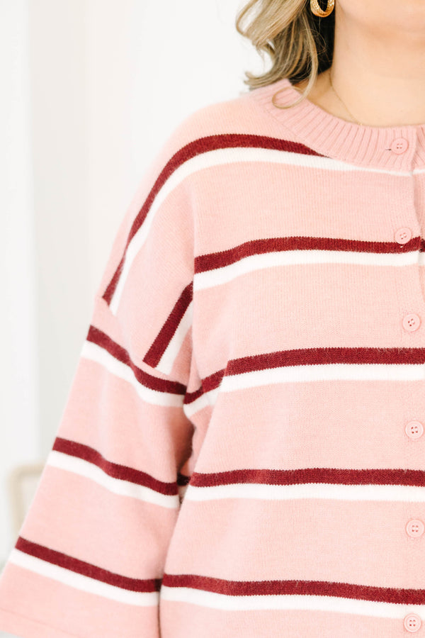 Plus size pink striped cardigan with a relaxed fit, button-down front, and soft knit fabric.