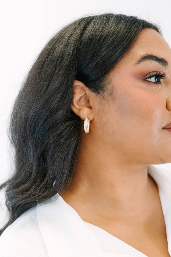 Plus Size gold hoop earrings with a textured, diamond-cut pattern and a polished finish.