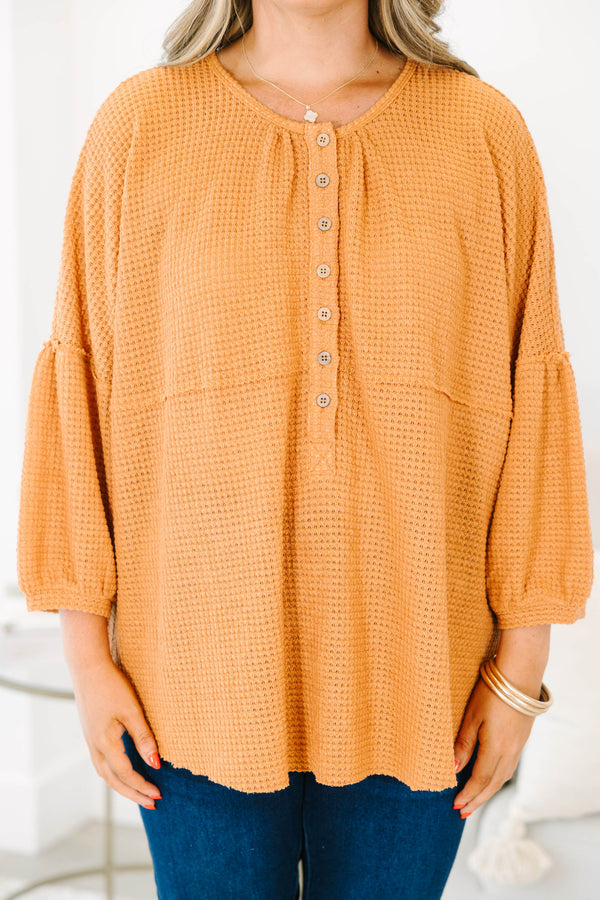 Chic Soul plus size clothing, rust colored baby doll top with buttons going down to the chest and three quarter inch bubble sleeves 