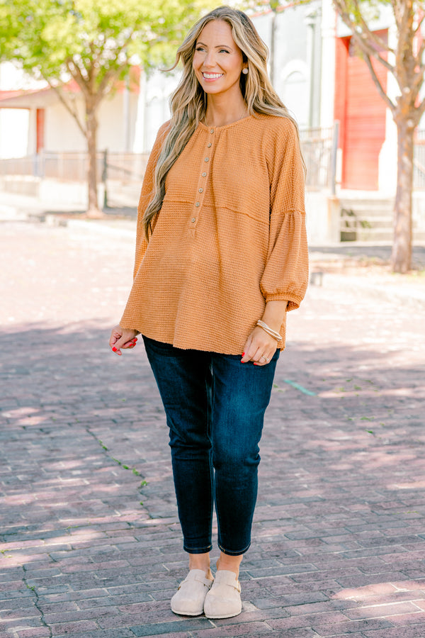 Chic Soul plus size clothing, rust colored baby doll top with buttons going down to the chest and three quarter inch bubble sleeves 