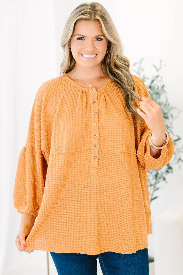 Chic Soul plus size clothing, rust colored baby doll top with buttons going down to the chest and three quarter inch bubble sleeves 