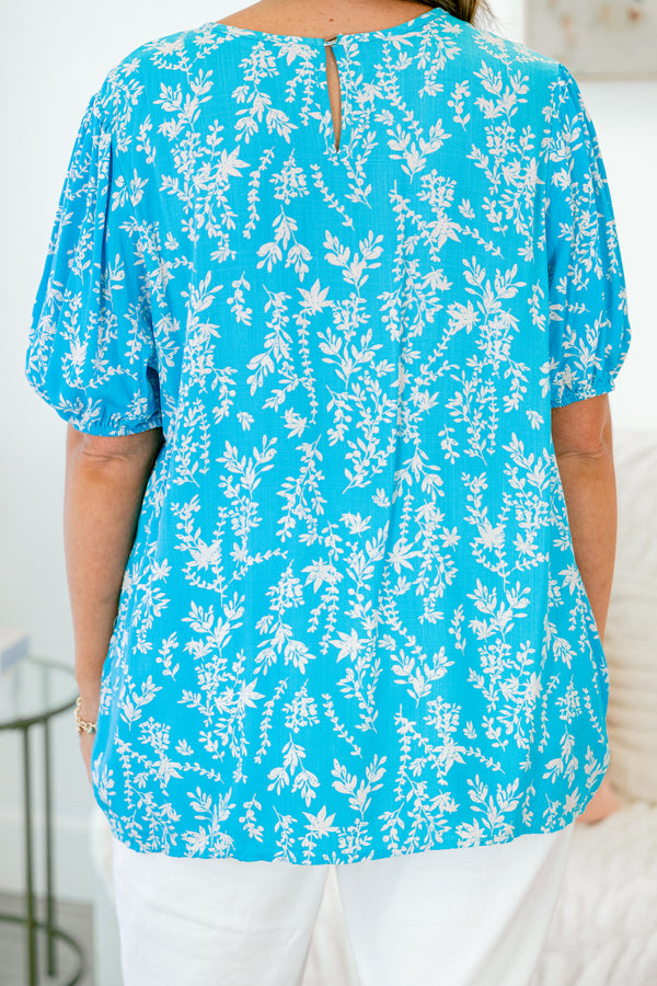 Chic Soul plus size clothing, short sleeve aqua top with white floral pattern and smocked scoop-neckline