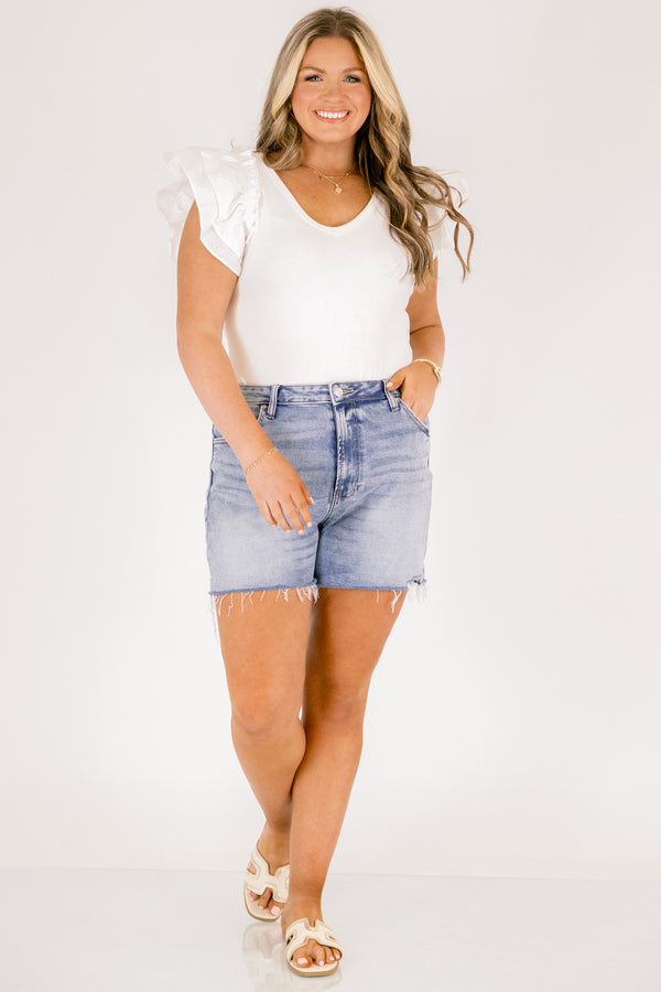 Chic Soul plus size clothing, light-medium wash mid thigh length denim shorts with distressed hem