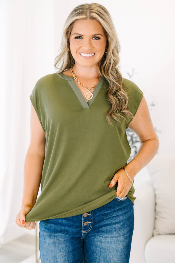Plus Size olive cap sleeve top with a notched neckline and soft microribbed texture.