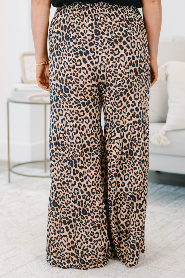 Plus Size wide-leg tiered pants in a dark leopard print with a smocked elastic waistband.