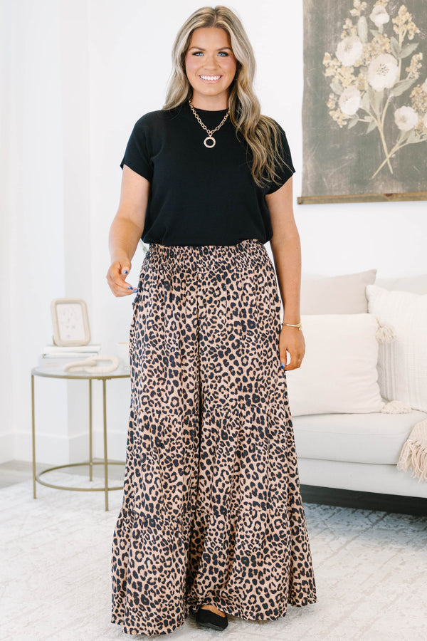 Plus Size wide-leg tiered pants in a dark leopard print with a smocked elastic waistband.