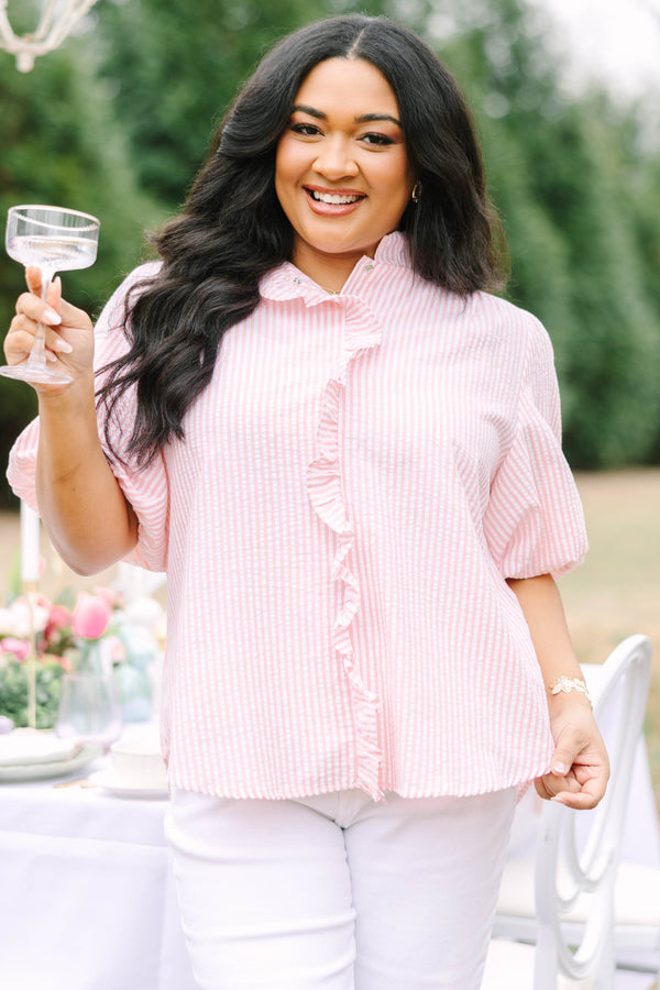 Chic Soul plus size clothing, peach top with a white striped pattern bubble sleeves and a ruffle going around the neckline and going down the center of the top 