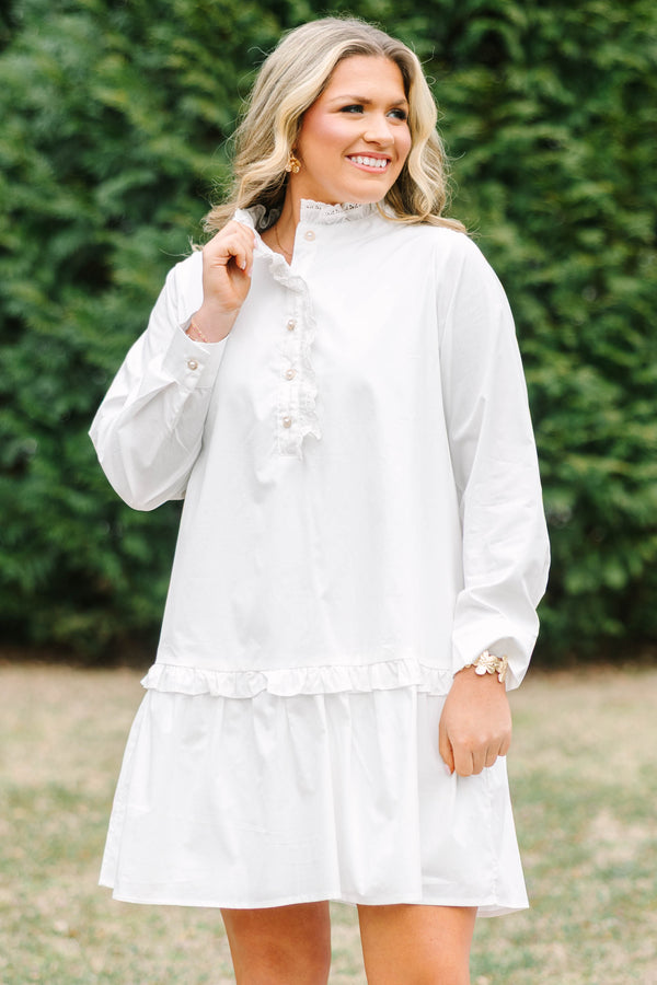 Chic Soul plus size clothing, white knee length dress with buttons going down to the chest as well as a lace ruffle detail on the collar and the button-up section 