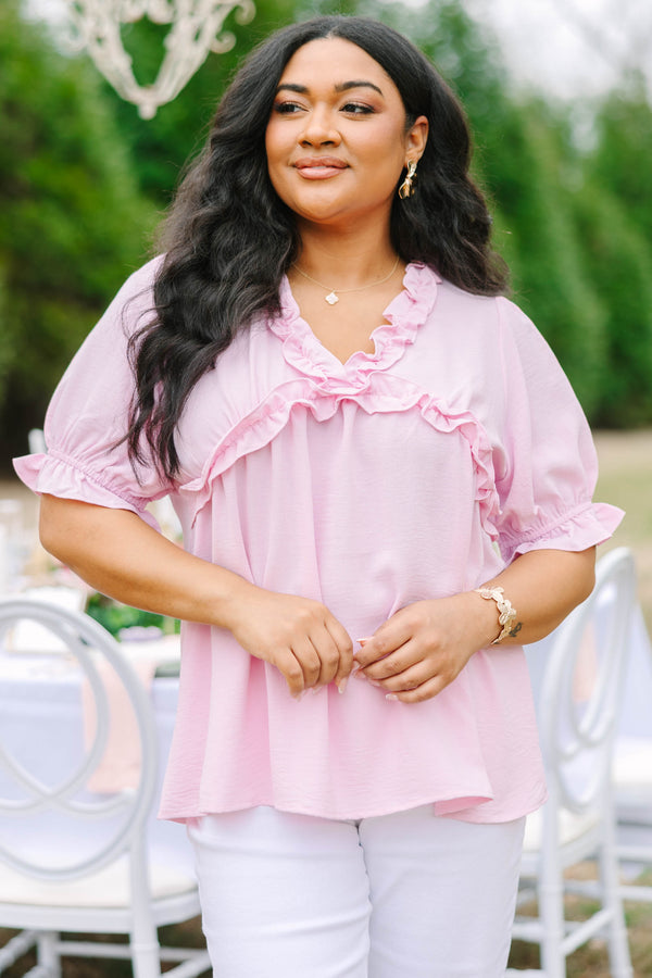 Chic Soul plus size clothing, light pink top with bubble sleeves as well as a v-neckline and ruffle detailing going along the neckline under the bust and at the end of each sleeve 