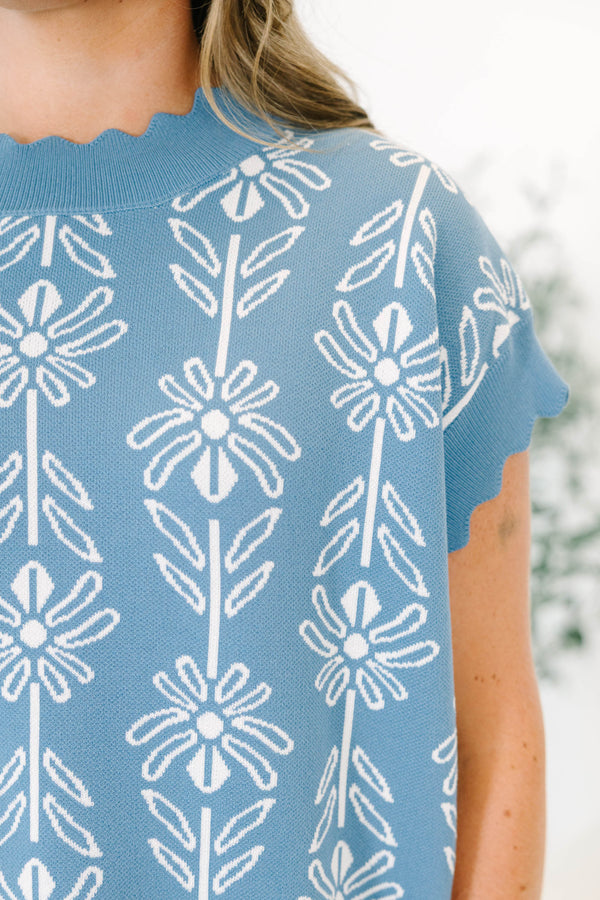 Plus size short sleeve floral sweater with scallop details on hemline, sleeves and neck line