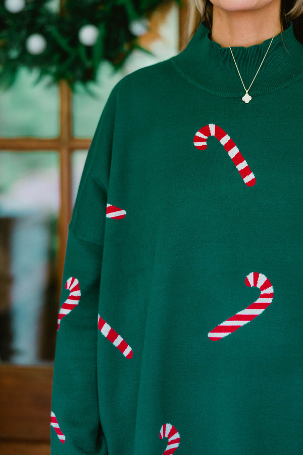 Chic Soul plus size clothing, green long sleeve high neck sweater with candy cane prints throughout the sweater