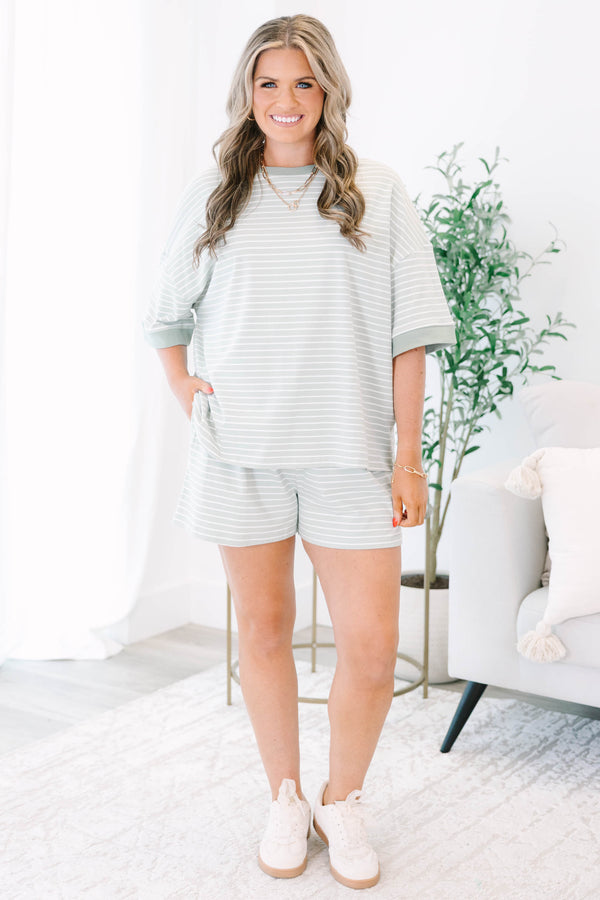 Plus Size sage green and white striped loungewear set with a short-sleeve top and matching shorts.