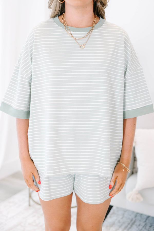 Plus Size sage green and white striped loungewear set with a short-sleeve top and matching shorts.