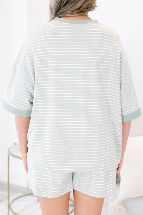 Plus Size sage green and white striped loungewear set with a short-sleeve top and matching shorts.