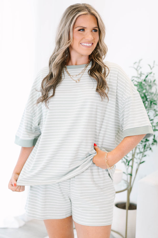 Plus Size sage green and white striped loungewear set with a short-sleeve top and matching shorts.