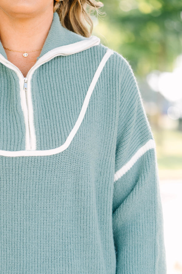 Plus Size olive green quarter-zip ribbed sweater with white trim and oversized fit.