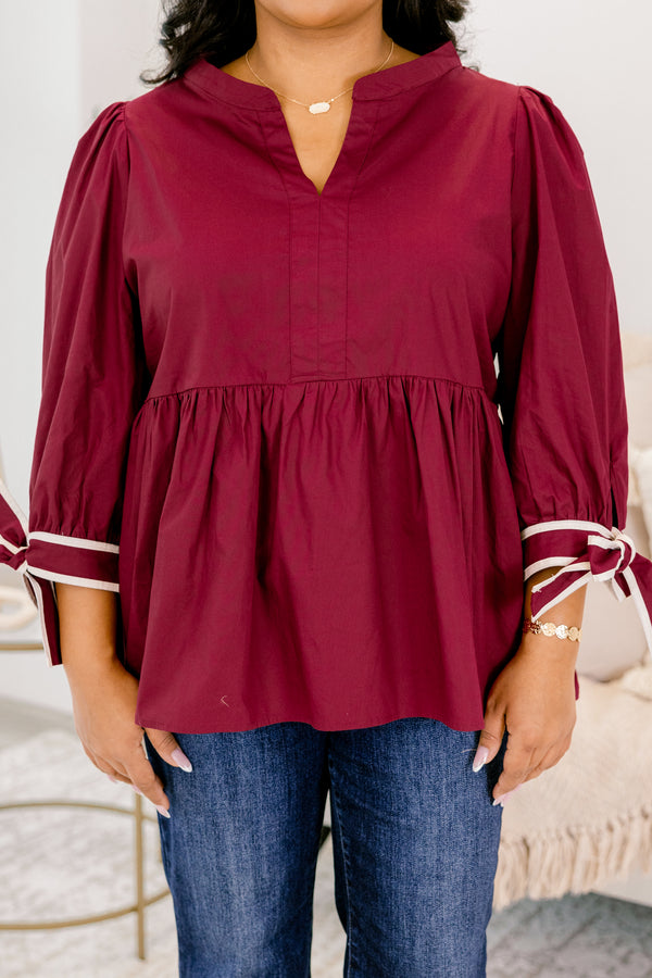 Chic Soul plus size clothing, burgundy red babydoll mid sleeve top with white trim bows at the wrists and v-neckline