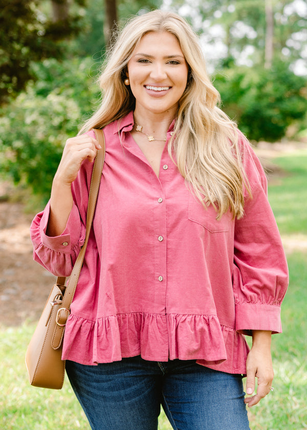 Chic Soul plus size clothing, pink corduroy long sleeve button up top with ruffle at the bottom of them hem and a front pocket