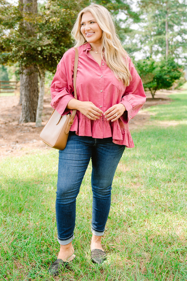 Chic Soul plus size clothing, pink corduroy long sleeve button up top with ruffle at the bottom of them hem and a front pocket