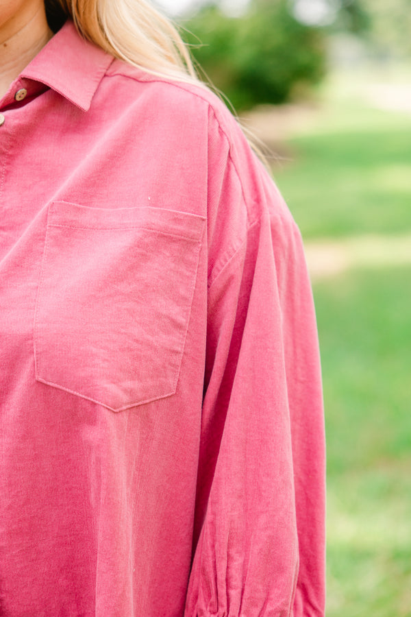 Chic Soul plus size clothing, pink corduroy long sleeve button up top with ruffle at the bottom of them hem and a front pocket