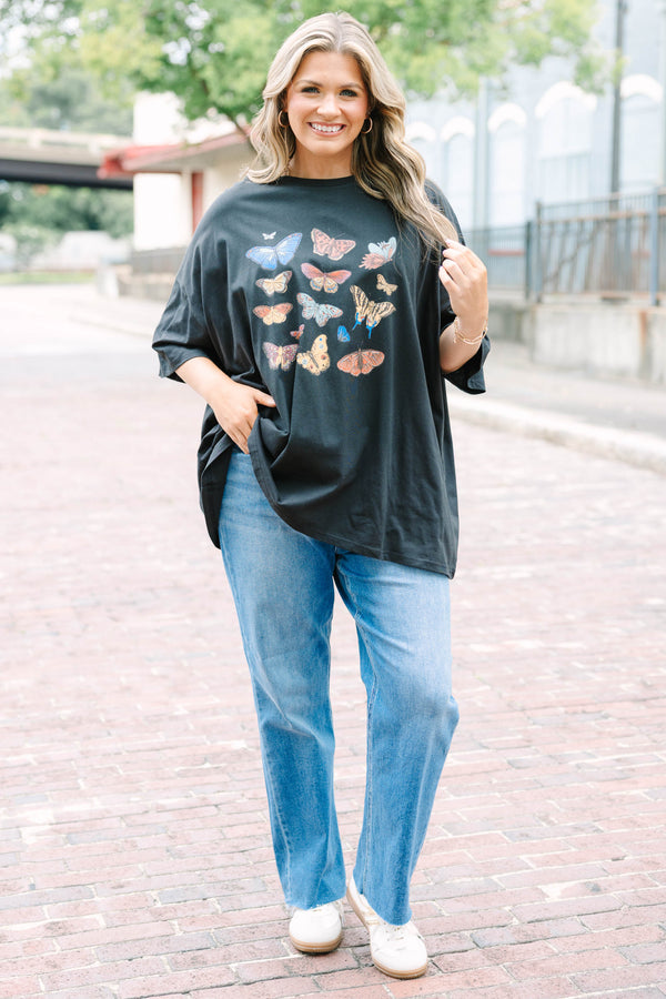 Chic Soul plus size clothing, black oversized boyfriend tee with an assortment of butterflies