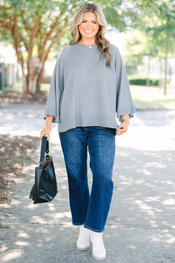 Plus Size gray crewneck sweater with wide three-quarter length sleeves and a ribbed hem.