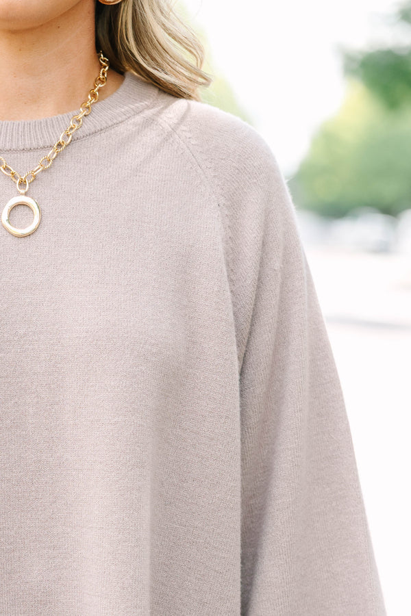 Plus size light mocha raglan sweater with a relaxed fit, crew neck, and flowy elbow-length sleeves.
