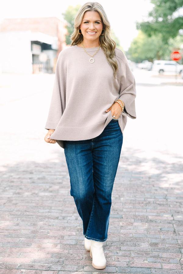 Plus size light mocha raglan sweater with a relaxed fit, crew neck, and flowy elbow-length sleeves.
