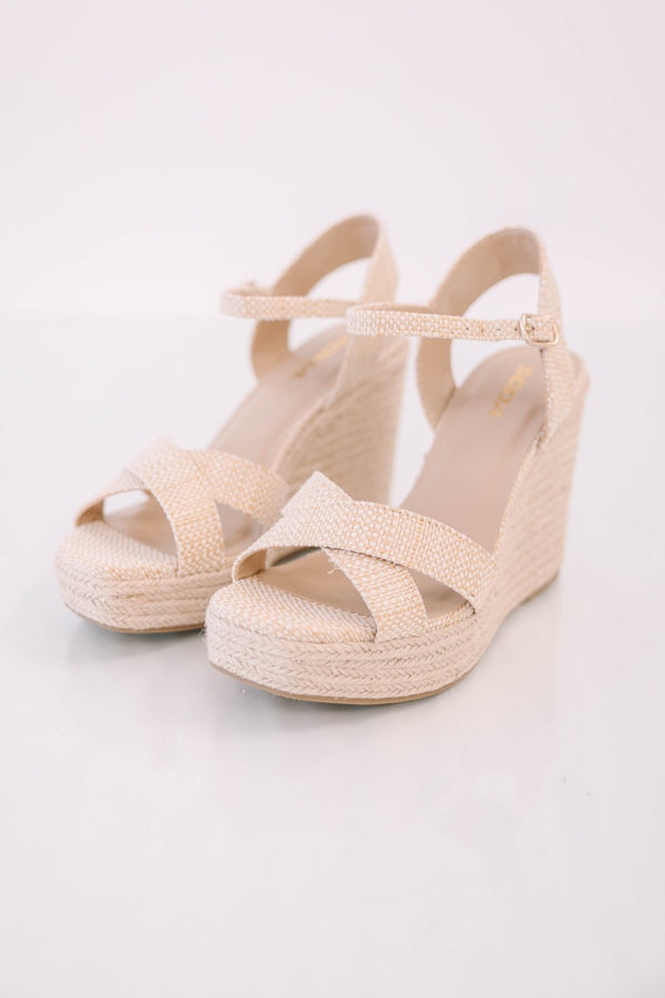 Plus Size natural woven fabric wedge sandals with crisscross straps and an adjustable ankle strap.