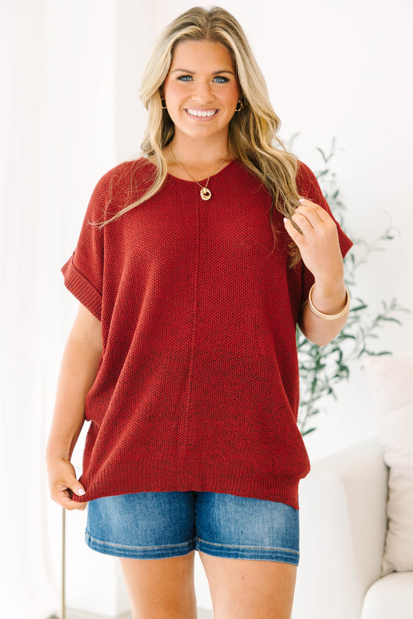 Plus size Cabernet red short sleeve knit sweater with a relaxed fit and ribbed hem.