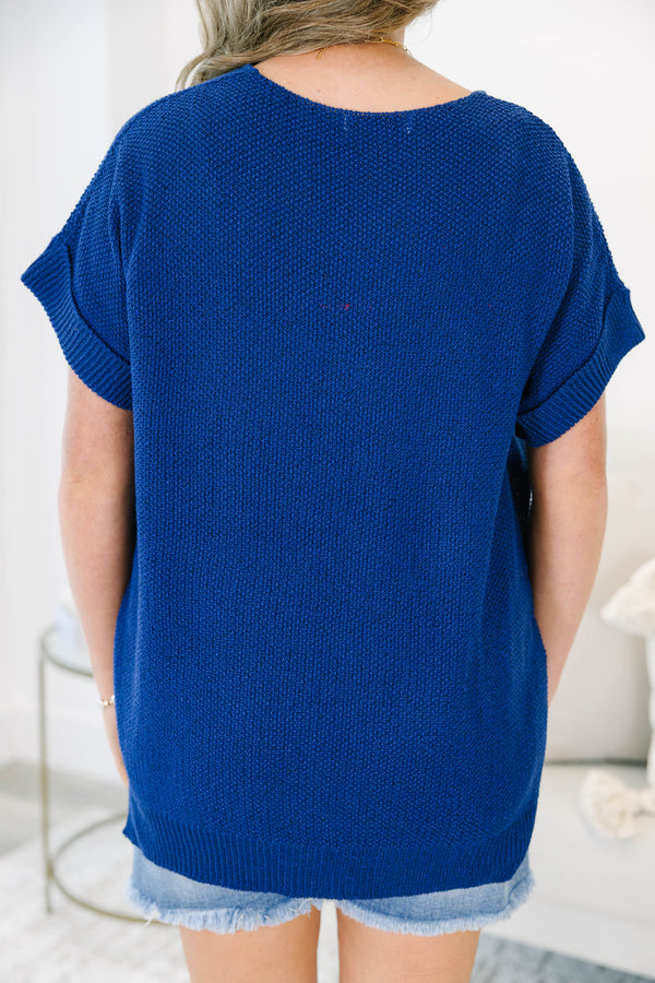Plus size light navy short sleeve sweater with a flowy fit and textured knit fabric.