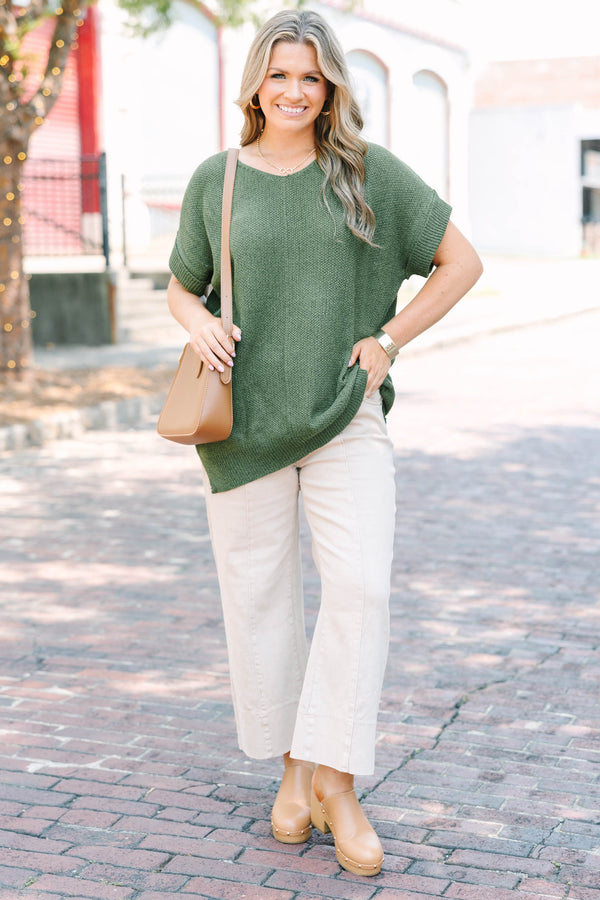 Plus Size light olive short sleeve knit sweater with a round neckline and relaxed fit.