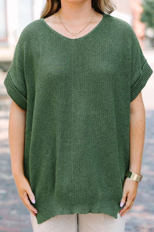 Plus Size light olive short sleeve knit sweater with a round neckline and relaxed fit.