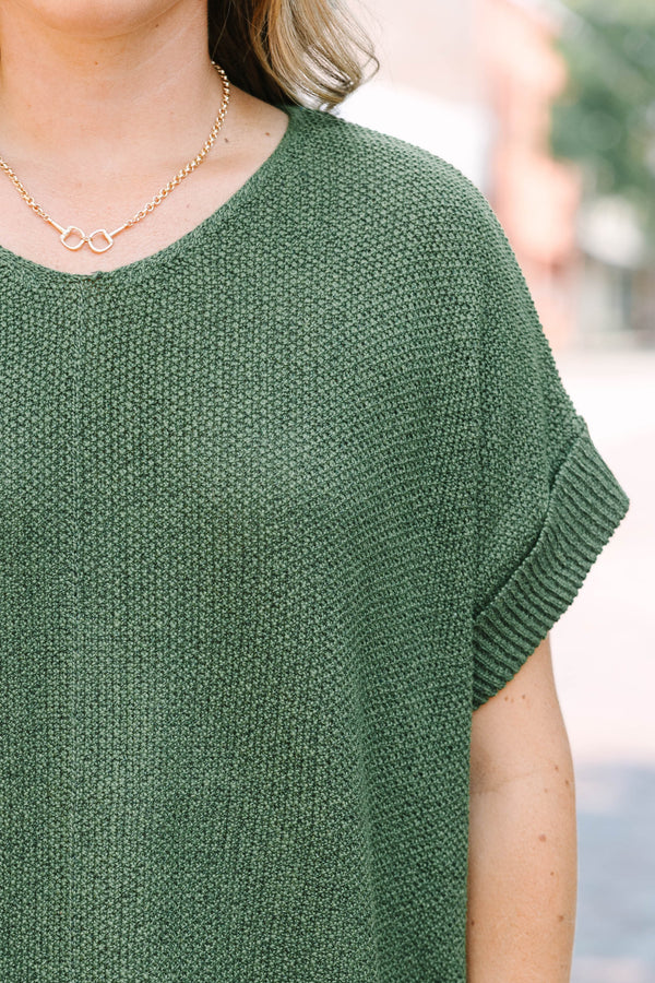 Plus Size light olive short sleeve knit sweater with a round neckline and relaxed fit.