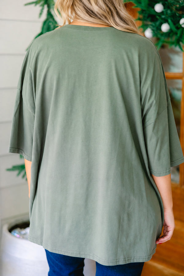 Plus Size moss green oversized boyfriend tee with a plaid Merry Christmas graphic.