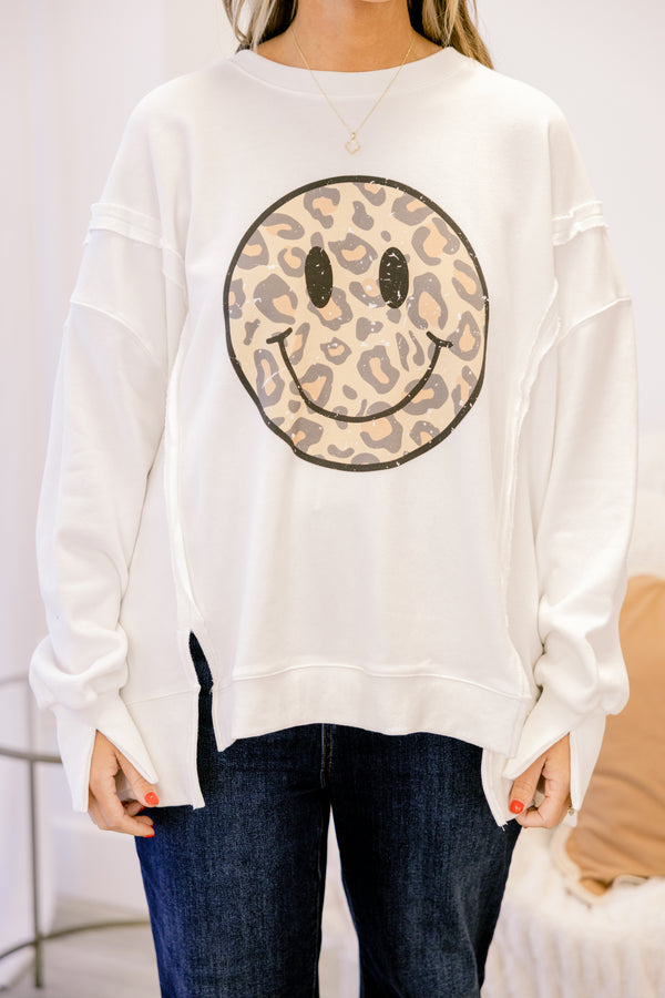 Chic Soul plus size clothing, ivory long sleeve crew neck with leopard print smiley face graphic in the middle