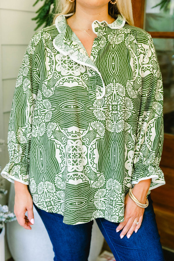 Chic Soul plus size clothing, green and white abstract print long sleeve top with a slight v neckline and ruffle detailing around the neckline and sleeves