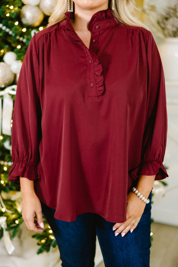 Chic Soul plus size clothing, dark red long sleeve blouse with buttons down the front and ruffles on the sleeves and along the buttons