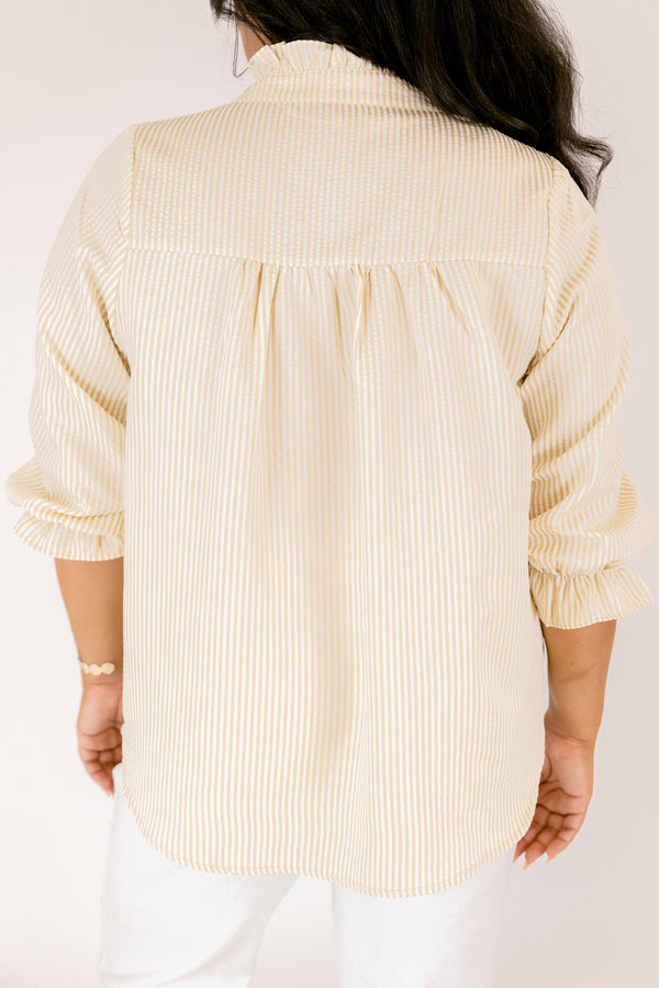 Chic Soul plus size clothing, tan striped top with half sleeves that have a ruffle on the ends of each sleeve as well as ruffle detailing along the button-up neckline