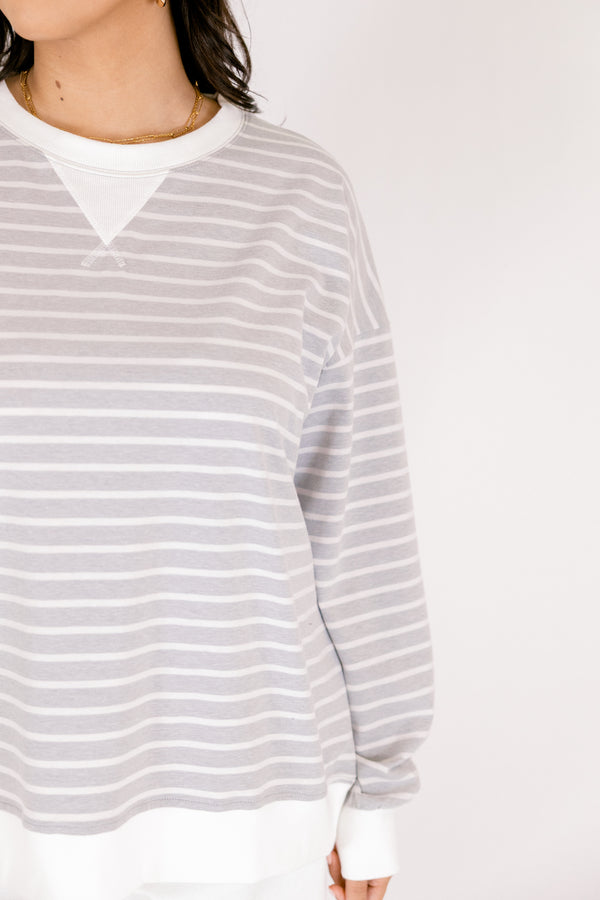 Chic Soul plus size clothing, light grey long sleeve crew neck pullover with thin white horizontal striping and white trim around the collar and hem