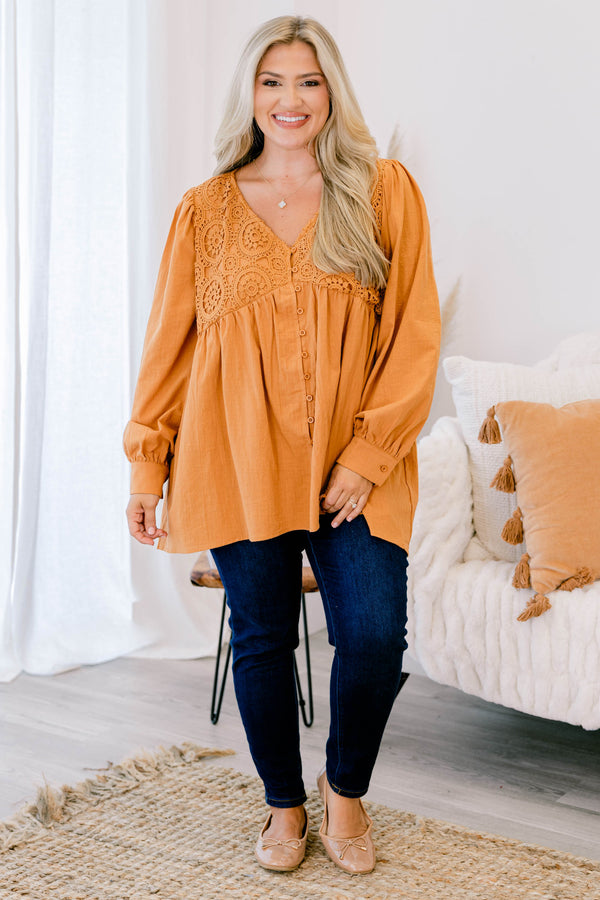 Chic Soul plus size clothing, long sleeve orange top with cuffed bubble sleeves with v neckline and textured geometric design along chest with button up detail down the front