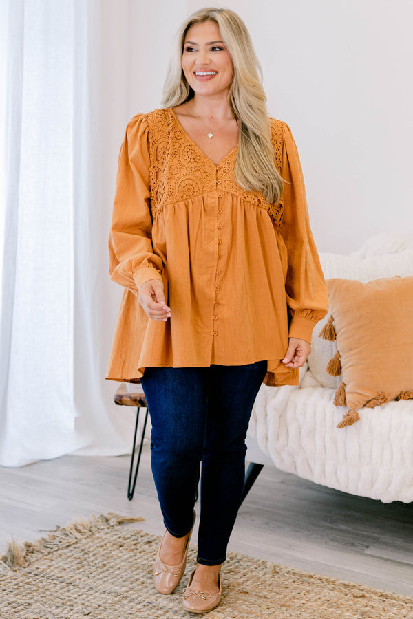 Chic Soul plus size clothing, long sleeve orange top with cuffed bubble sleeves with v neckline and textured geometric design along chest with button up detail down the front