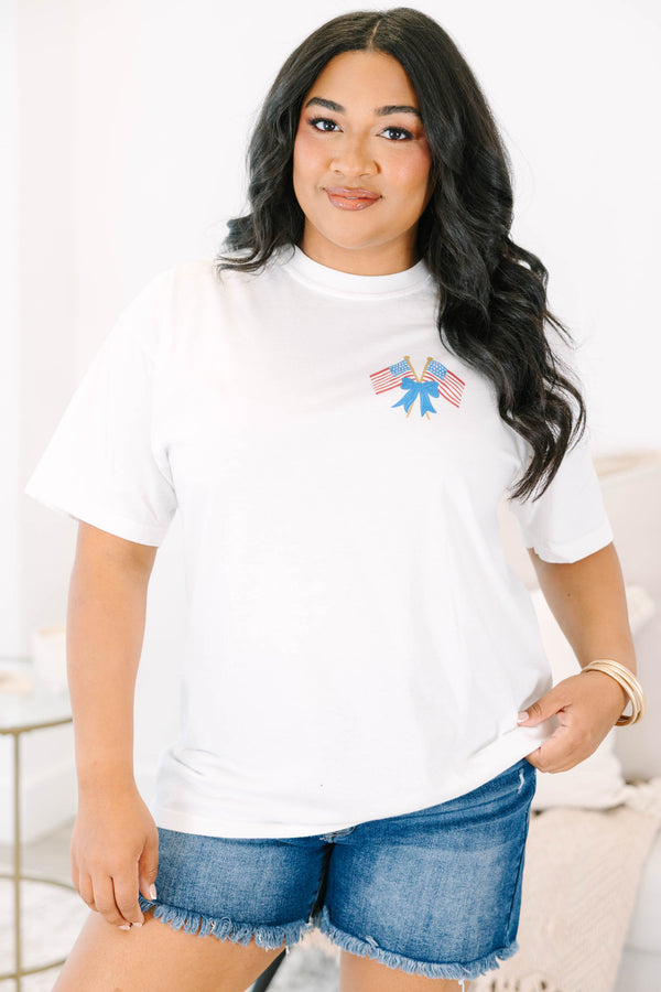 Plus Size white vintage wash tee with a small American flag and blue bow graphic on the upper right chest and a back graphic of American flags and blue stripes.