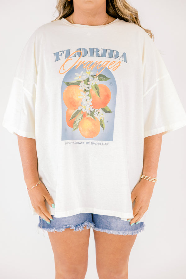 Chic Soul plus size clothing, ivory short sleeve graphic tee with an orange graphic on the center of the top and the saying 