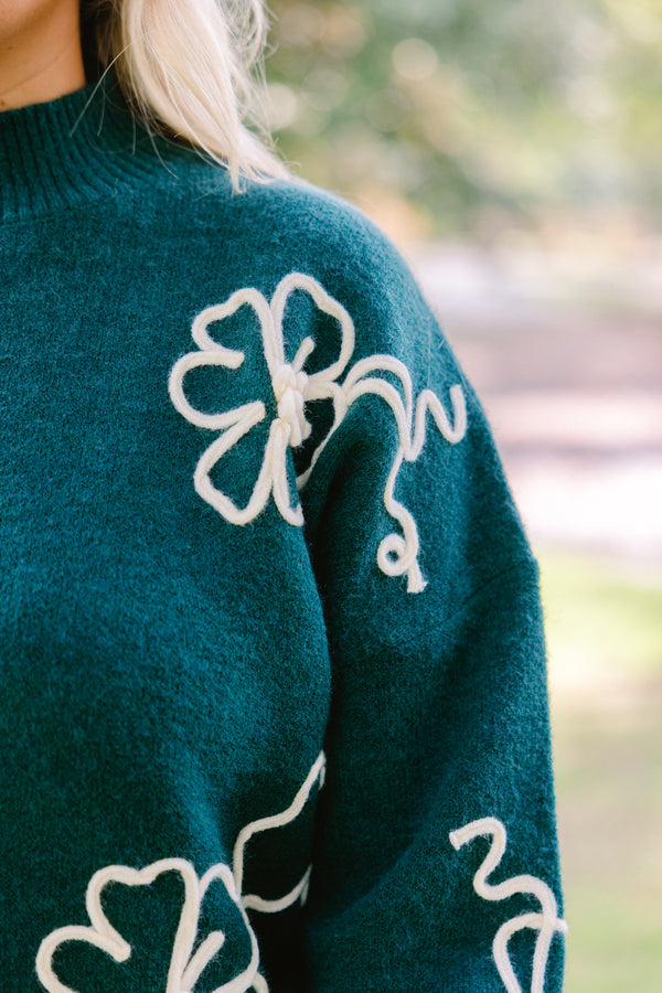 Chic Soul plus size clothing, dark green mock neck long sleeve sweater with white flowers on the sleeves