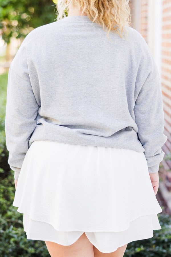 Chic Soul plus size clothing, long-sleeve heather gray crewneck pullover with pale pink football graphic with lettering stating 