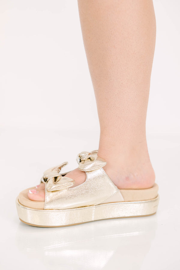 Plus Size gold metallic platform sandals with two straps featuring decorative bow details.