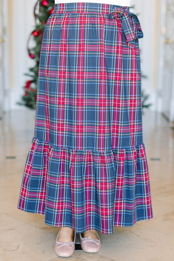Plus Size dark plaid maxi skirt with a tiered ruffle hem and a matching tie-waist detail.